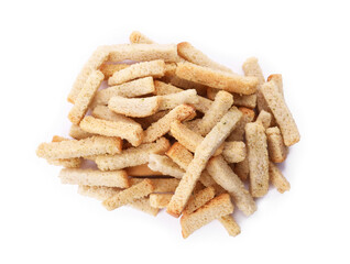 Heap of crispy rusks with seasoning on white background, top view
