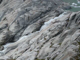 Cascading waterfall at the spring of River Rhone, Gletsch, Obergoms, Wallis, Valais, Switzerland
