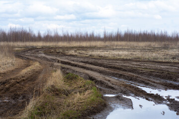Bad country road. A dirt road damaged. Clay, dirt. Concept problem with the roads. human impact on...