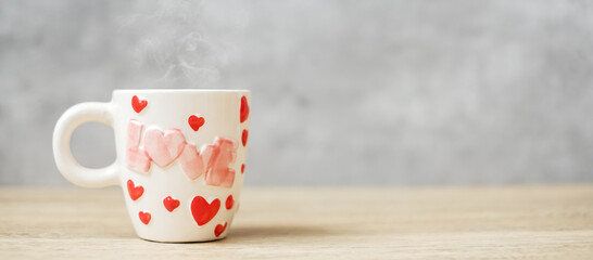 coffee mug on wood table background in the morning, Blank copy space for text. International coffee day, happy Valentine day and daily routine concept