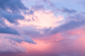 Naklejka na ściany i meble Red sky at sunset with moody storm clouds, UK