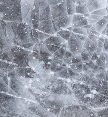 Crushed ice in a puddle as an abstract background.