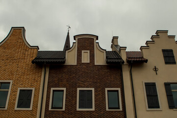 Obraz premium Old house with windows, beautiful brick houses