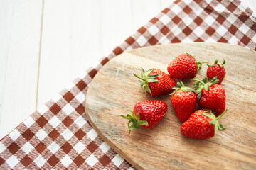 fresh strawberries on wooden board fruit vitamins summer