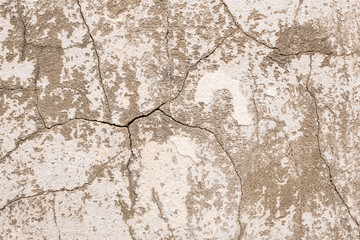 Fototapeta premium Cracked concrete texture. Close-up background.