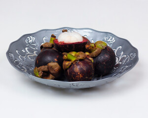 Mangosteen is a tropical fruit from Asia. Mangosteen has a distinctive sweet and sour taste. Mangosteen also has a myriad of benefits, properties, and nutritional content that is useful for health.
