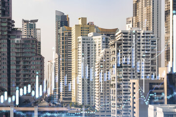 Forex and stock market chart hologram over panorama city view of Bangkok, the financial center in Southeast Asia. The concept of international trading. Double exposure.