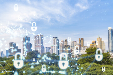 Padlock icon hologram over panorama city view of Bangkok to protect business in Southeast Asia. The concept of information security shields. Double exposure.