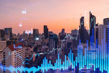 Glowing FOREX graph hologram, aerial panoramic cityscape of Bangkok at sunset. Stock and bond trading in Southeast Asia. The concept of fund management. Double exposure.