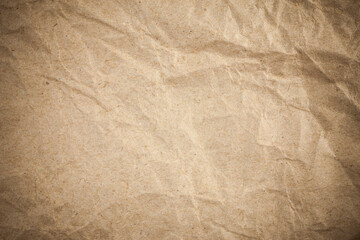 Textured crumpled packaging brown paper background.