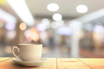 hot coffee at office blurry background