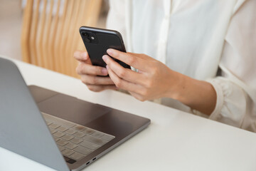 work using typing computer texting cell phone.student study education online learning.adult professional chatting on laptop,mobile contact us at Thinking business plan.connecting people concept