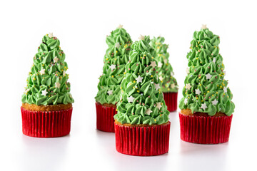 Christmas tree cupcakes isolated on white background