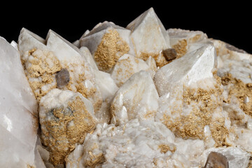 Macro mineral stone Snow quartz with calcite on a black background