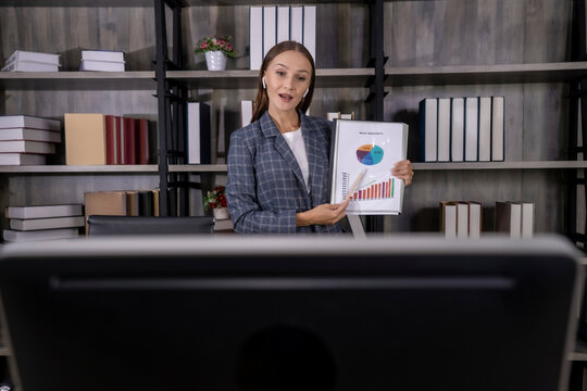 Business Woman Presenting Data Idea , Statistics And Strategy To Business Partners Or Colleagues Group Enjoy Teamwork Working On The Video Conference Meeting