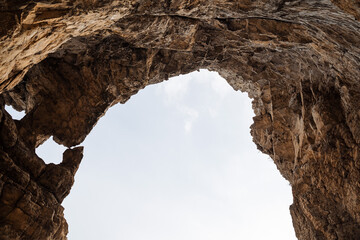 Ust Katavskaya Cave on the Katav River, Southern Ural Russia. Maryin Rock cliff in winter. Hapov ridge in the snow