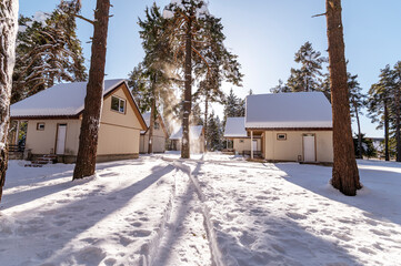 Landscape colourful house village in winter with snow at Bulgaria.