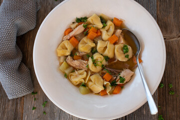 Plate with chicken noodle soup