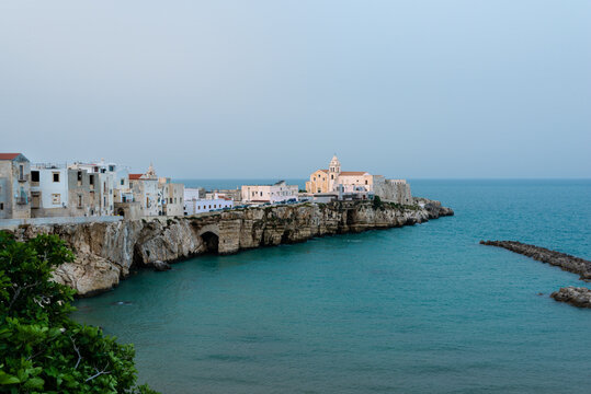 Vieste old town skyline on a cliff over the Mediterranean Sea, with churches and traditionnal houses, Gargano National Park, Puglia, Italy