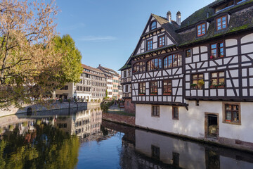 Fototapeta na wymiar Houses on a canal in Petite France district in Strasbourg