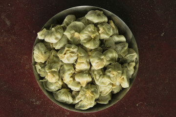 the plate is full by soft tasty momos.