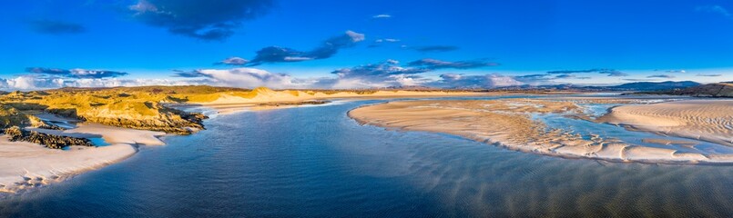 The coast between Kiltoorish bay beach and the Sheskinmore bay between Ardara and Portnoo in Donegal - Ireland