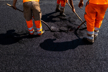 Paving a road with porous asphalt for traffic noise reduction in Geneva, switzerland - obrazy, fototapety, plakaty