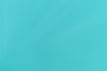 The murky sea water is turquoise in colour. The colour of the sea under the water is smooth. Background for the text. Copy space