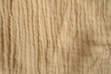 Backdrop - beige muslin cotton fabric from above