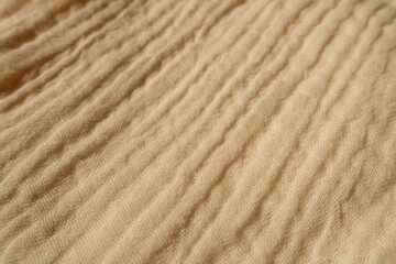Close up of beige muslin cotton fabric