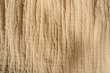 Top view of beige muslin cotton fabric