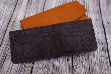 Brown unisex leather wallet. Handmade products made of genuine soft leather. Wallet for money and cards. Open Wallet