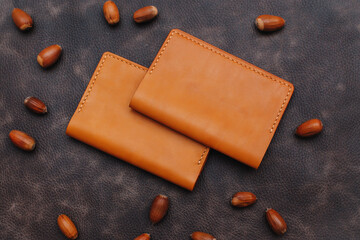 Handmade products made of genuine brown leather. Leather passport cover, leather wallet. Leather goods for men. Top view. 