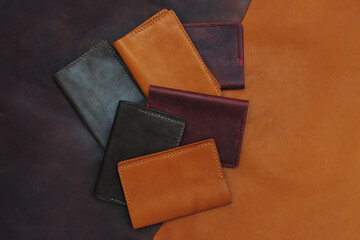 Handmade products made of genuine brown leather. Leather passport cover, leather wallet. Leather goods for men. Top view. 