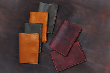 Handmade products made of genuine brown leather. Leather passport cover, leather wallet. Leather goods for men. Top view. 