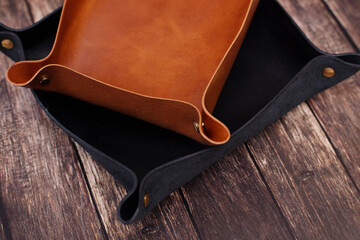 Products made of genuine leather. Tray for small items made of handmade leather. Products for sale made of genuine leather