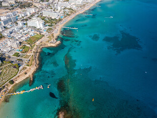 Aerial view of resort town with blue sea