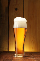 mug with light beer and foam