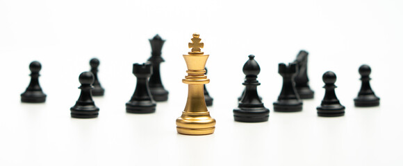 Golden Chess King standing to Be around of other chess, Concept of a leader must have courage and challenge in the competition, leadership and business vision for a win in business games