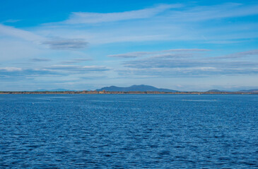 Fototapeta premium Monte Argentario (Italy) - A view of the Argentario mount on Tirreno sea, with little towns; in the Grosseto province, Tuscany region. Here in particular Orbetello village.