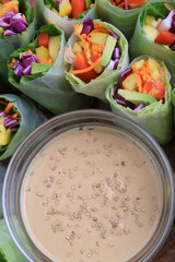 rice paper rolls with vegetables and peanut sauce