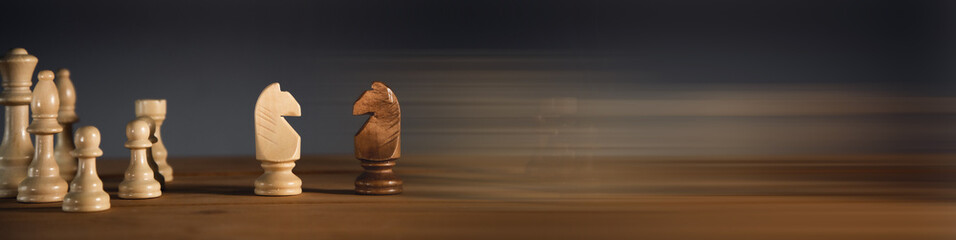 chess pieces on the wooden background