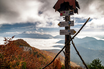 Colorful autumn forests and inversion under the mountains