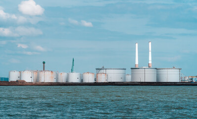 Fototapeta premium Le Havre, France - August 8, 2021: Tanks and reservoirs for storing fuel and liquids in the port 2000 of Le Havre in Normandy