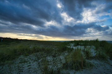 View over the dunes to the Baltic Sea at sunset