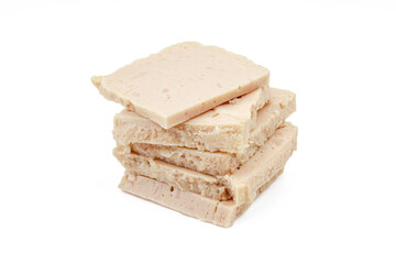 Slices of canned turkey meat isolated on white background