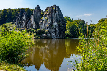 Externsteine rock formation with lake in front of Teutoburg Forest - Teutoburger Wald /...