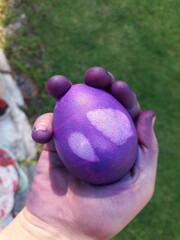hand holding Easter egg