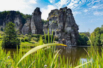 Externsteine rock formation with lake in front of Teutoburg Forest - Teutoburger Wald /...