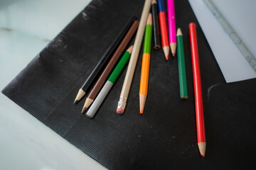 Colored pencils on black background,Colors for bright colors.